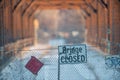 Bridge closed sign in front of dilapidated bridge Royalty Free Stock Photo