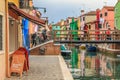Wooden bridge in colourful Burano in the Venetian lagoon Royalty Free Stock Photo