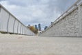 Bridge concrete sidewalk in city background