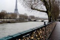 Bridge Covered in Padlocks Next to River, A Symbol of Eternal Love and Connection, A love lock bridge over the river Seine with