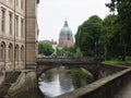 a bridge crossing over a river in a city area with tall buildings Royalty Free Stock Photo