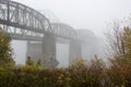 Bridge disappears in the fog