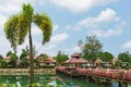 Bridge with flowers across the bay in a tropical garden