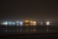 Bridge in the fog, over the Bay. Royalty Free Stock Photo