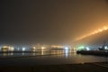 Bridge in the fog, over the Bay. Royalty Free Stock Photo
