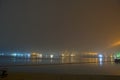 Bridge in the fog, over the Bay. Royalty Free Stock Photo