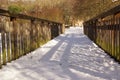 Bridge, forest snow and sun - France Royalty Free Stock Photo