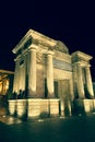 Bridge Gate (Puerta del Puente) triumphal Renaissance arch illuminated at night in Cordoba, Andalusia, Spain Royalty Free Stock Photo