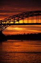 Bridge with golden orange sky at sunset Royalty Free Stock Photo