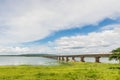 The bridge of Her Majesty Thepsuda,Lam Pao Dam,Kalasin province,Thailand with the blue sky and cloud.