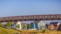 Bridge and homes against sky in Oquirrh Lake