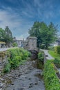 The Bridge House sits directly over Stock Beck burn in Ambleside Royalty Free Stock Photo