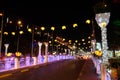 A bridge illuminated by street lamps at night. Beautiful street lighting Royalty Free Stock Photo