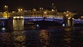 Bridge with illumination over the river at night