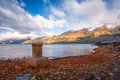 The bridge of lake Wakatipu taken in cloudy suset with long exposure at Glenorchy, Otago region, New Zealand. Royalty Free Stock Photo