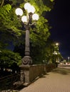 Bridge with lampposts across canal in Riga Royalty Free Stock Photo