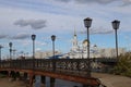 bridge with lanterns, in the background the Temple, the city of Kokshetau