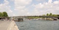 Bridge Leopold Sedar Senghor.Tourists stroll on the bridge and