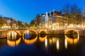 A bridge with lights over the Keizersgracht Canal