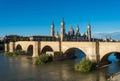 Bridge of lions and the ancient cathedral of Zaragoza Royalty Free Stock Photo