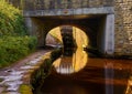 Bridge and Lock Gate, Huddersfield Narrow Canal at Marsden, West Yorkshire, England Royalty Free Stock Photo
