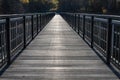 A bridge made of planks in central europe. Crossing the river bu