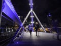 Bridge in Melbourne CBD over the Yarra River at night, people walking Royalty Free Stock Photo