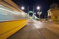 Bridge by night with blurred motion tram Royalty Free Stock Photo