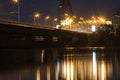 Bridge through the night river Royalty Free Stock Photo