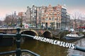 Bridge over an Amsterdam canal in Holland Royalty Free Stock Photo