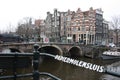 Bridge over an Amsterdam canal in Holland Royalty Free Stock Photo