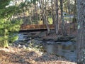 Bridge over babbling brook Royalty Free Stock Photo