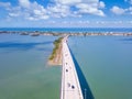 Bridge over the bay. Spring break or Summer vacations in Florida. Traffic on Beach Road. Ocean or Gulf of Mexico. Tropical nature. Royalty Free Stock Photo