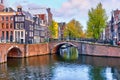 Bridge over channel in Amsterdam Netherlands houses river Amstel Royalty Free Stock Photo