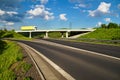 Bridge over an empty highway, going over the bridge truck