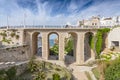 Bridge over the famous Lama Monachile beach in Polignano a Mare, Apulia, Italy Royalty Free Stock Photo