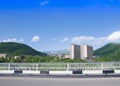 Bridge over the gorge of the Arpa River. View of Gladzor Sanatorium, mountains and blue sky. The city of Jermuk, Armenia Royalty Free Stock Photo