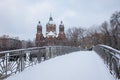 Bridge over isar river with view to st luke church, munich in wi Royalty Free Stock Photo