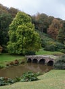 The bridge over the lake at Stourhead National Trust property near Warminster in Wiltshire UK