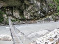 Bridge over Marsyangdi river near Tal village - Nepal Royalty Free Stock Photo