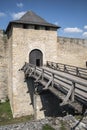 bridge over the moat, gates and walls of the ancient castle Royalty Free Stock Photo