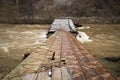 Bridge over a mountain river Royalty Free Stock Photo
