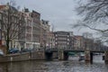 A bridge over the narrow canals of Amsterdam Royalty Free Stock Photo