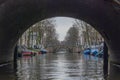 A bridge over the narrow canals of Amsterdam Royalty Free Stock Photo