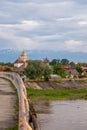 Bridge over the Olt river, view of the orthodox cathedral: Fagaras, Brasov County, Romania Royalty Free Stock Photo