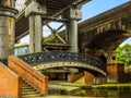 A bridge over part of the restored Victorian canal system in Castlefield, Manchester, UK Royalty Free Stock Photo