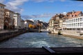 Bridge over the river Aare and urban buildings in the town of Thun in Switzerland Royalty Free Stock Photo