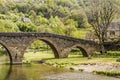 Bridge over the river Aveyron in the Villa Belcastel Royalty Free Stock Photo