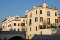 A bridge over the river Bacchiglione and some buildings sunlit inVeneto in Padua (Italy)