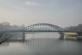 Bridge over the river in the fog Royalty Free Stock Photo